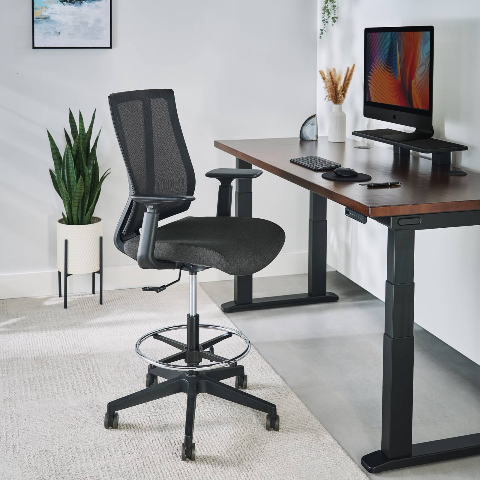 UPLIFT Clarksville Ergonomic Drafting Chair at a standing desk - Best for Standing Desks 2026. Image: UPLIFT Desk